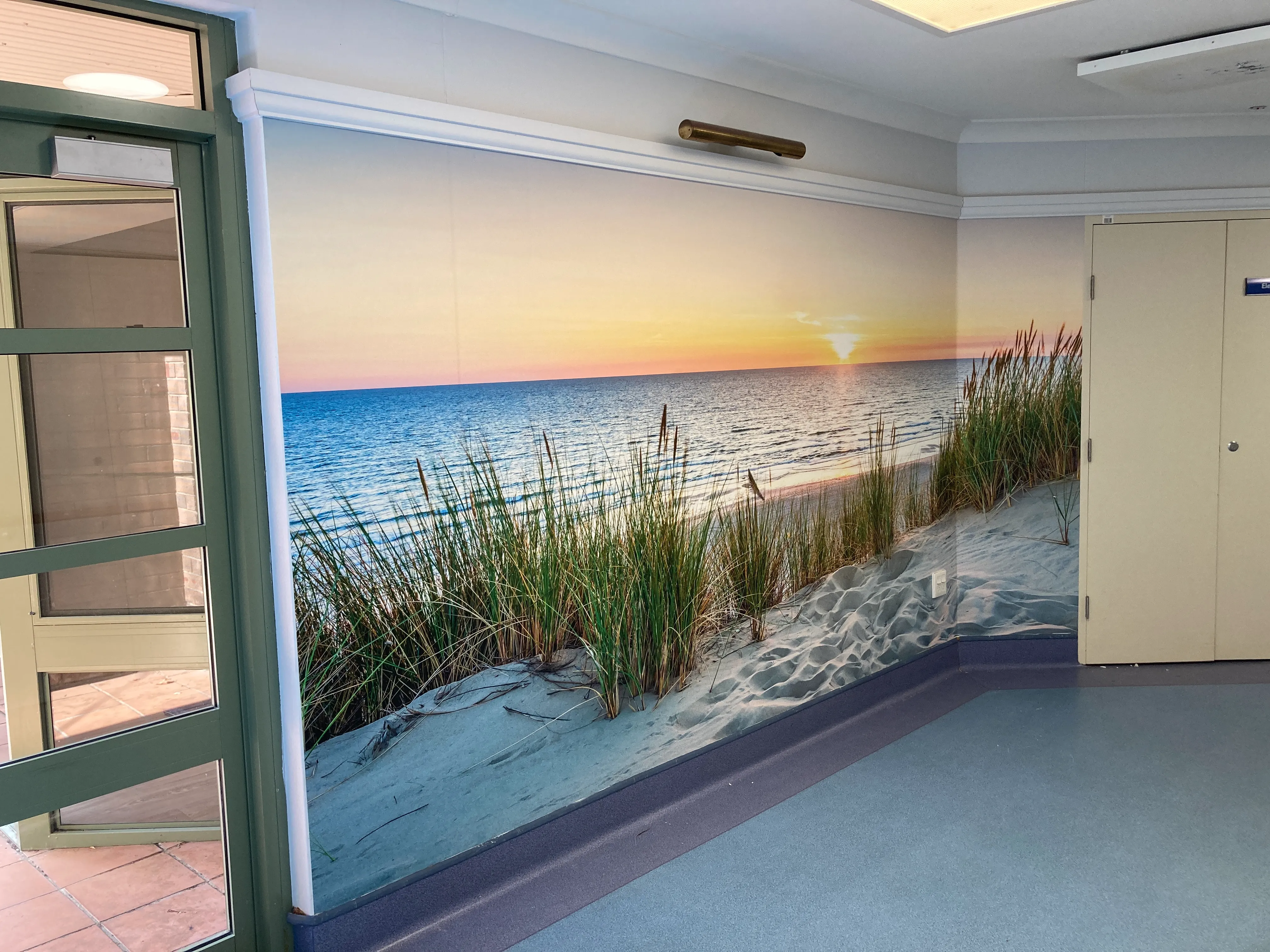 Sunset on beach wallpaper print in Aged care