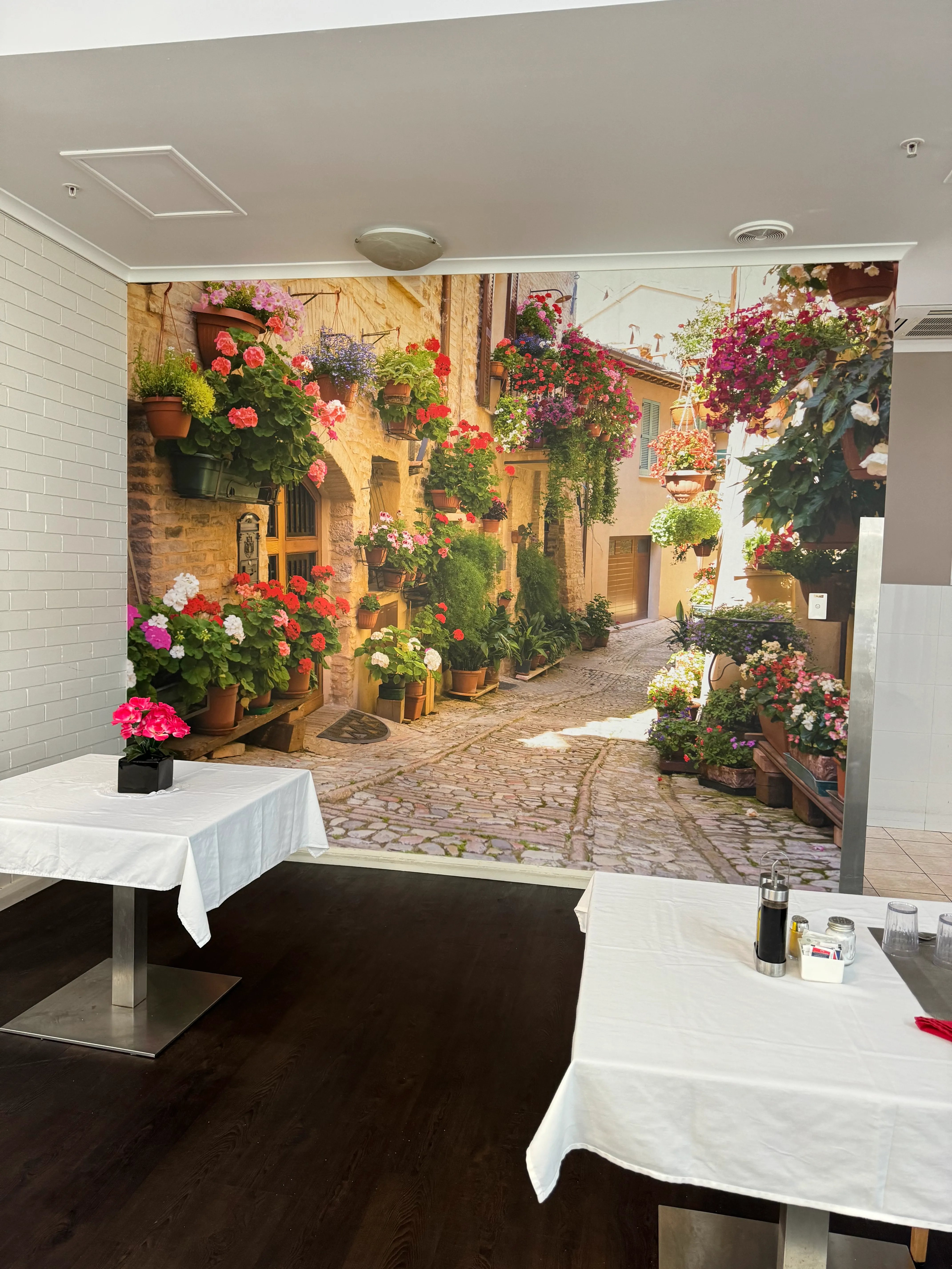 Italian street scene mural in Aged Care breakfast room