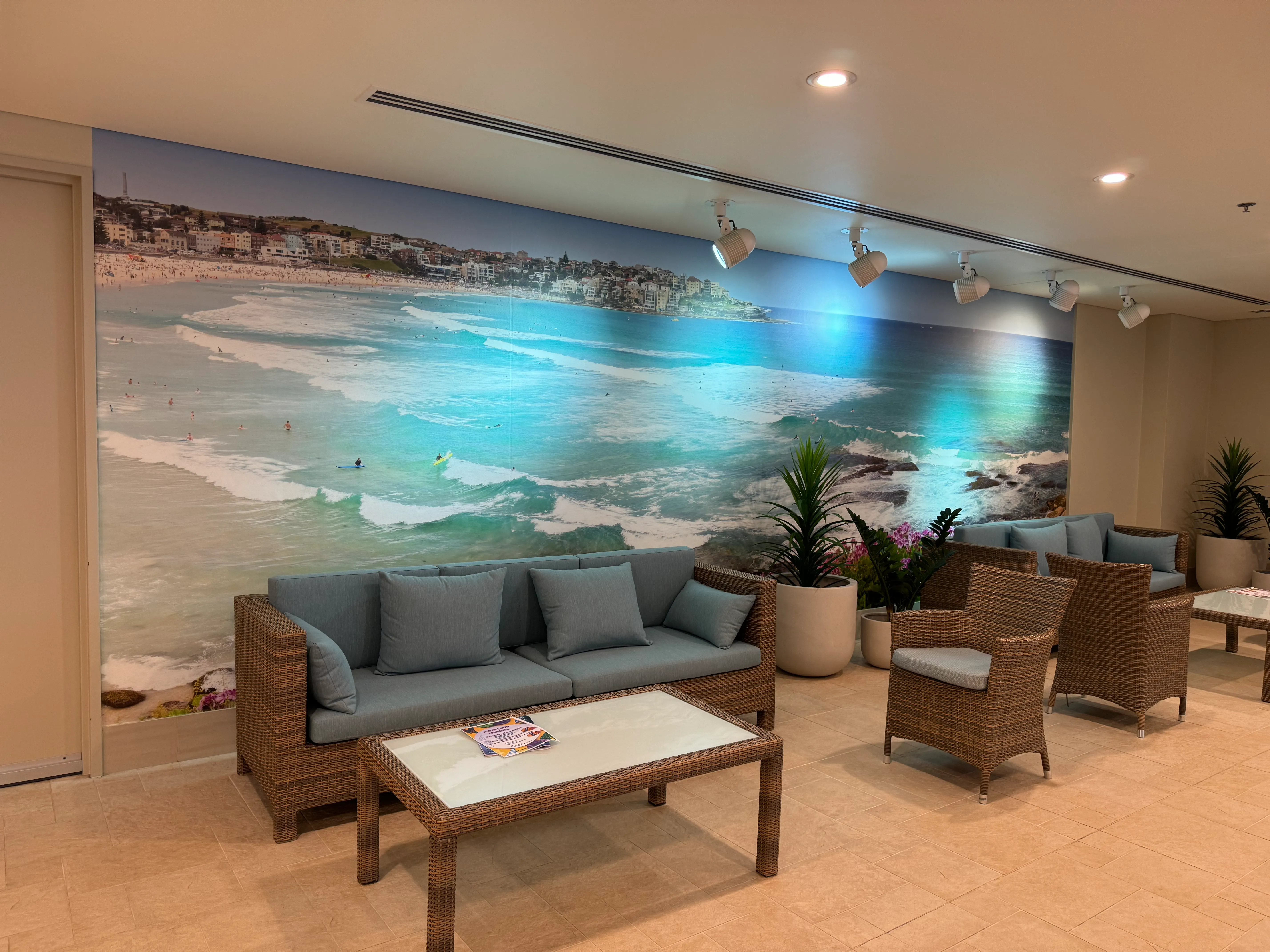 Bondi Beach wallpaper mural at lounge area in Aged Care facility