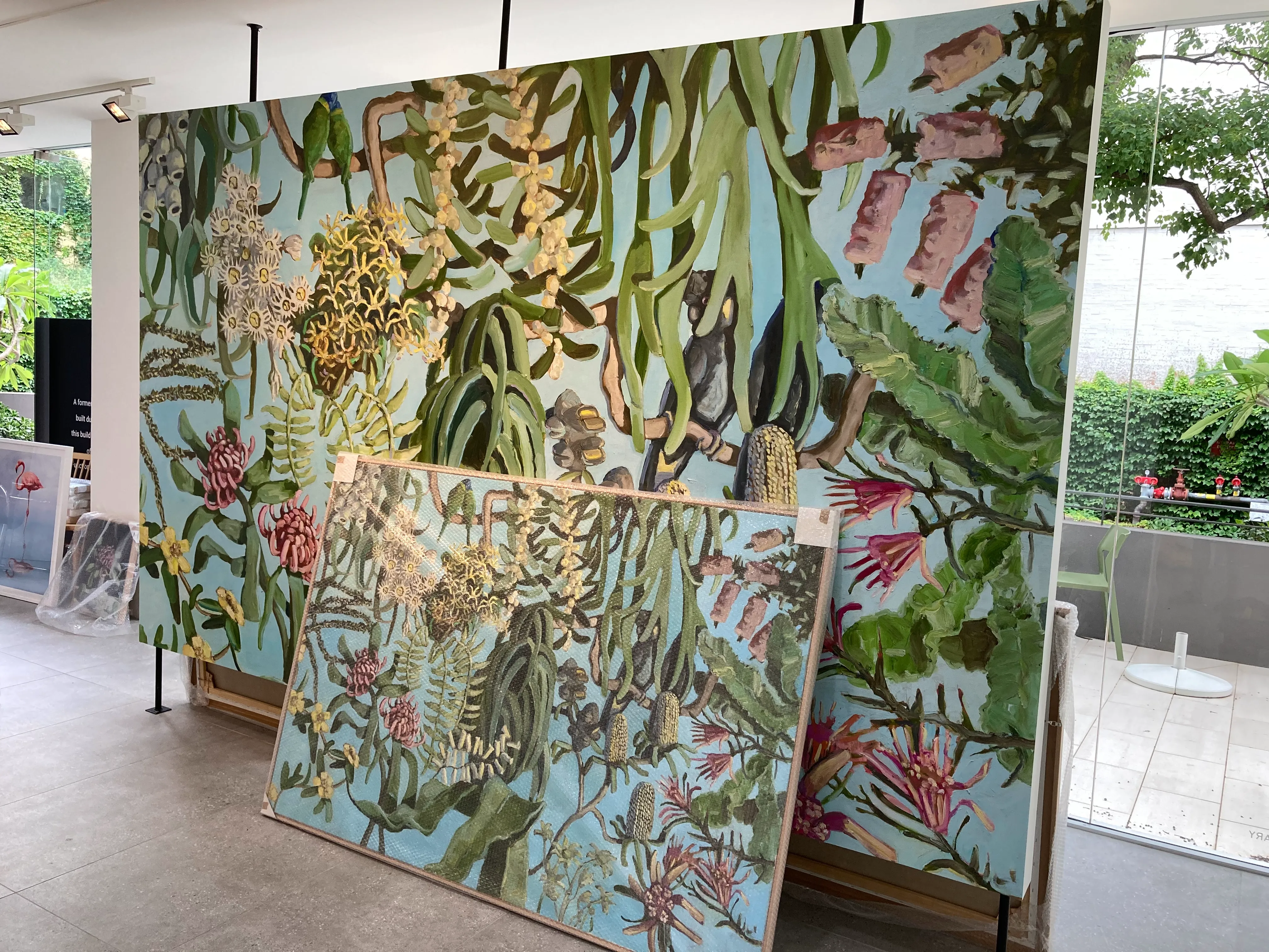 Original and reproduction on wallpaper of artist Jane Guthleben's painting at Mcontemporary Gallery