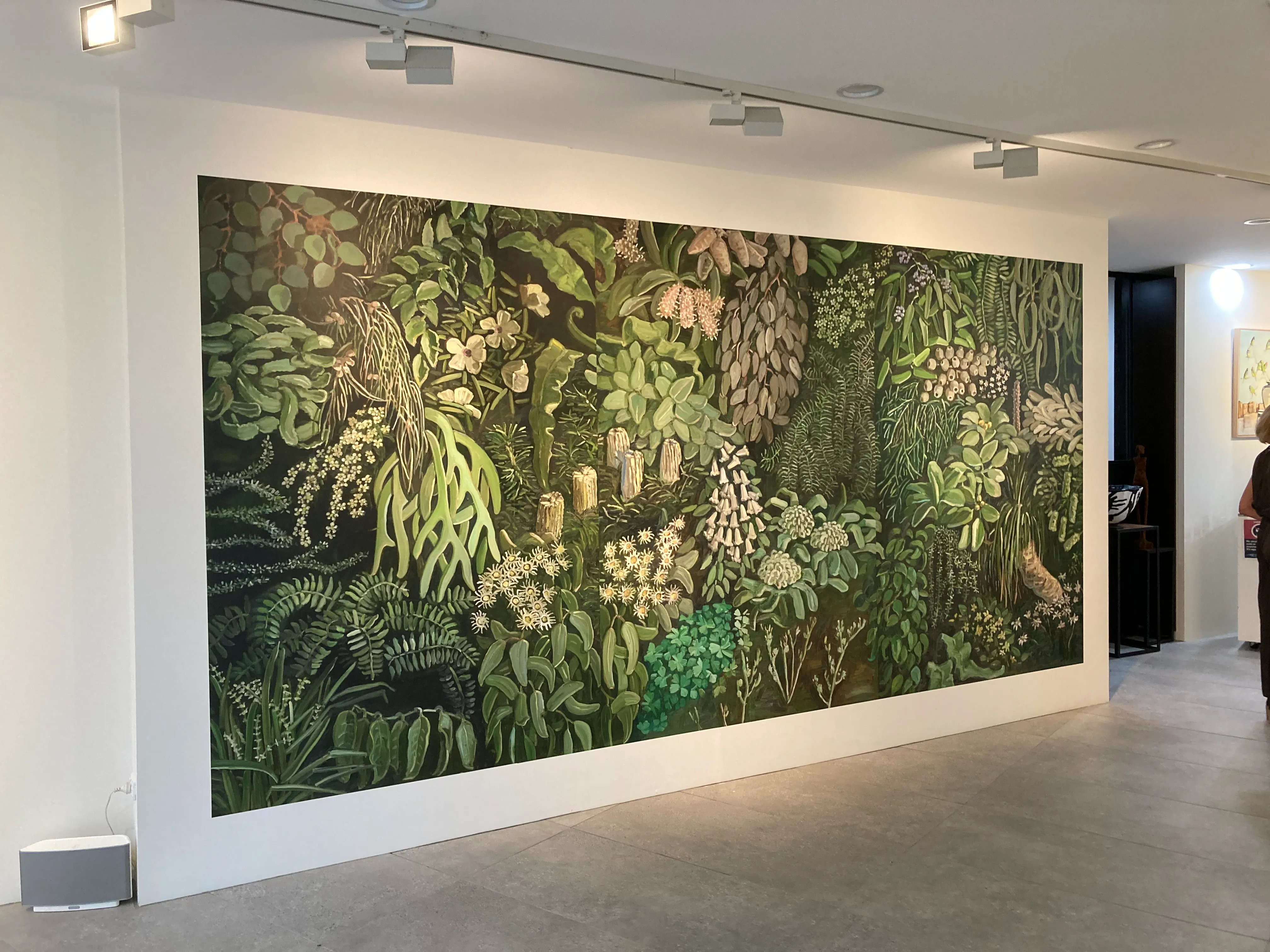 Reproduction of artist Jane Guthleben's painting on wallpaper at Mcontemporary Gallery