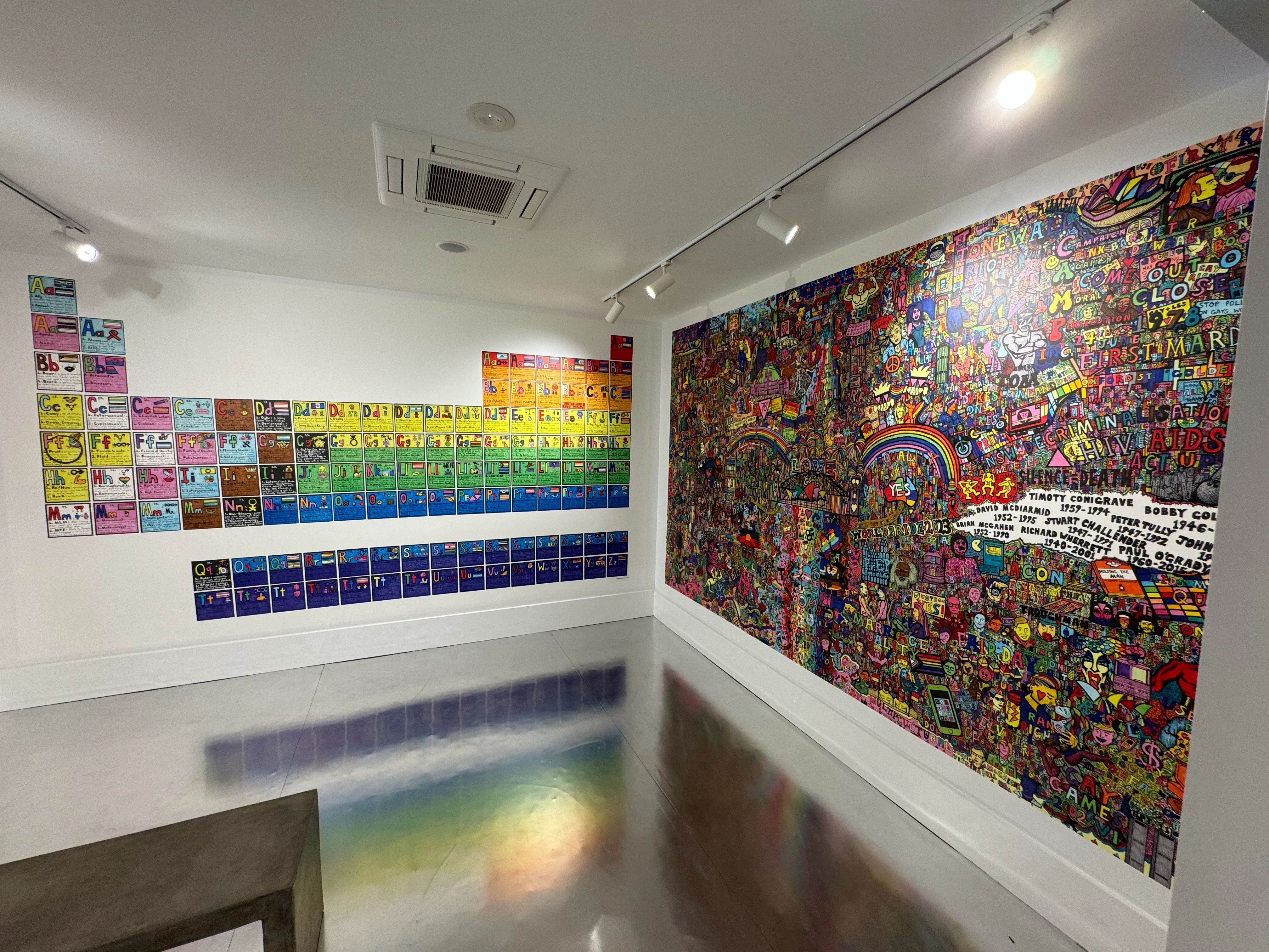 Several reproductions on custom wallpaper of artwork by artist jeremy Smith at Qtopia Sydney