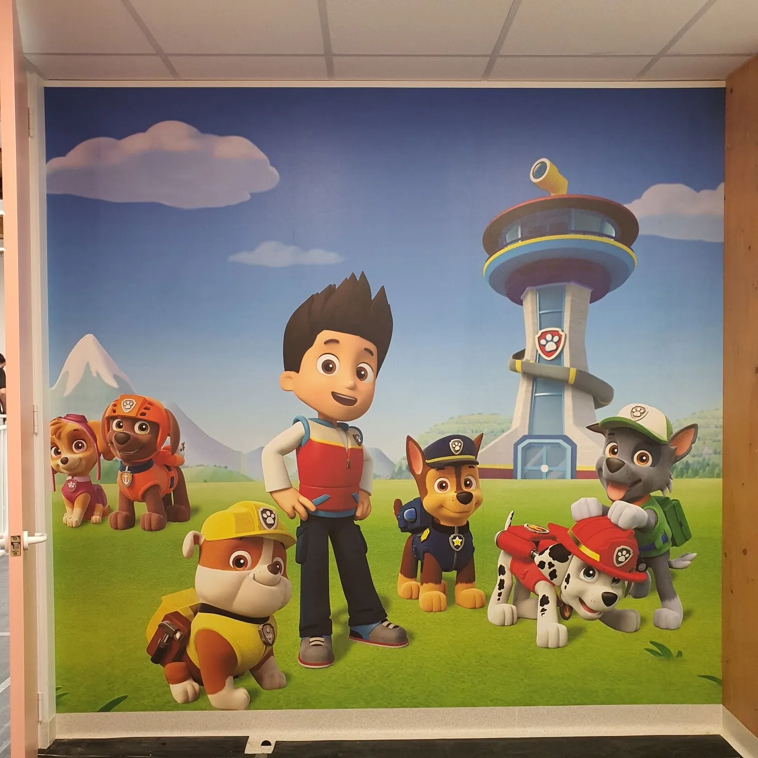 Joyful kid's wallpaper mural in Paediatrician practice