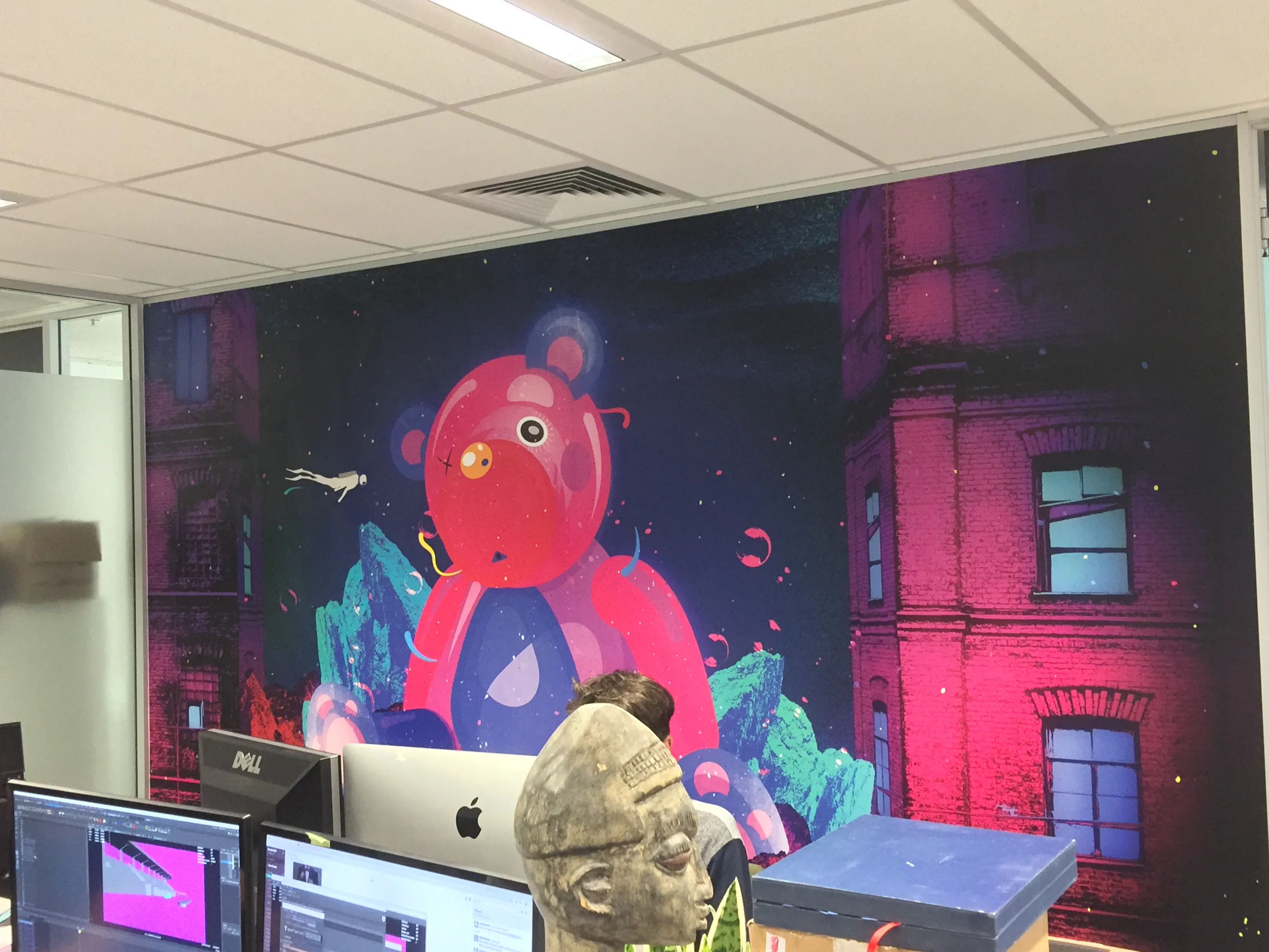 Artistic illustration wallpaper mural at an event organiser's office