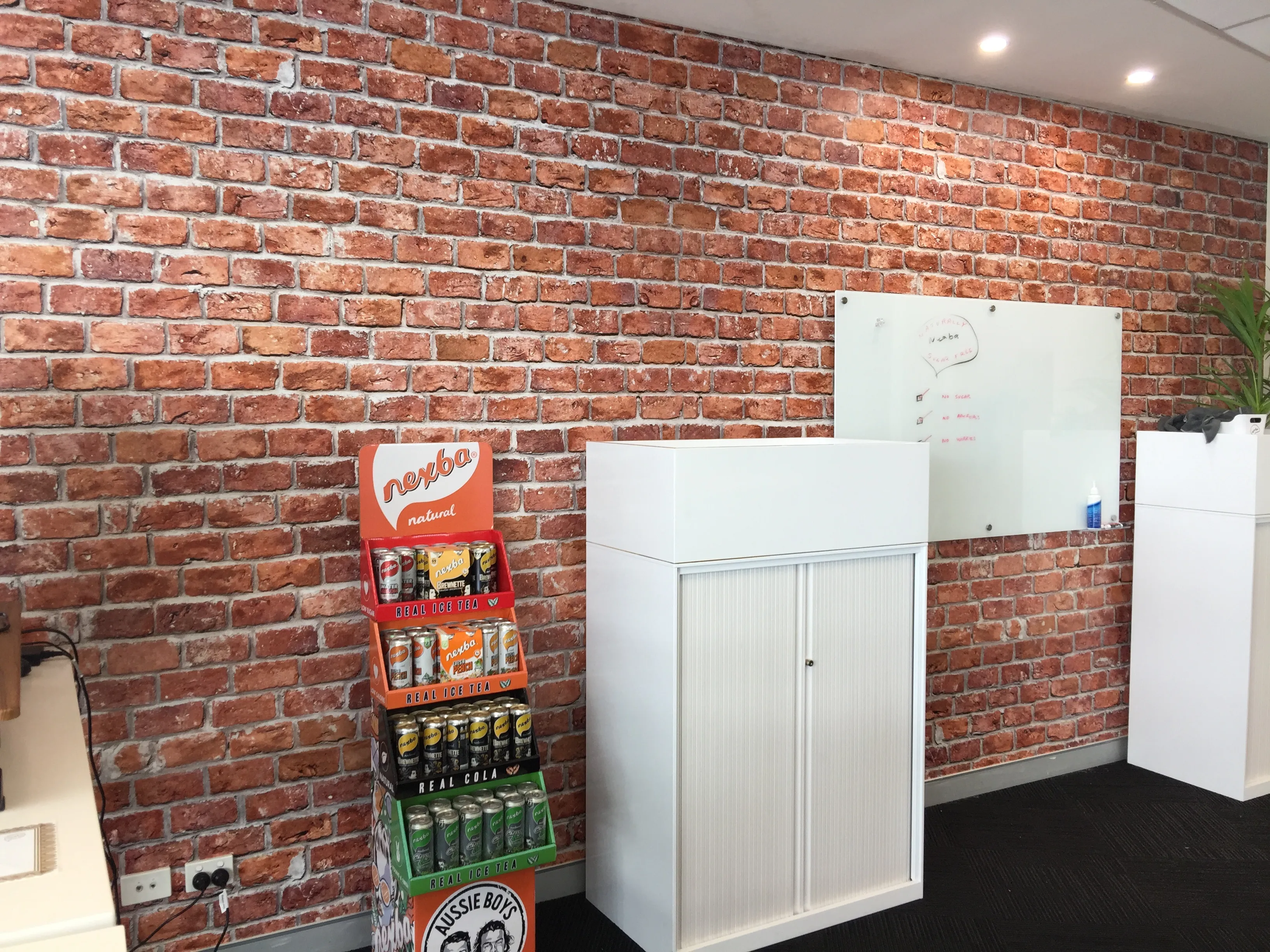 Custom printed brick wallpaper mural in Sydney office