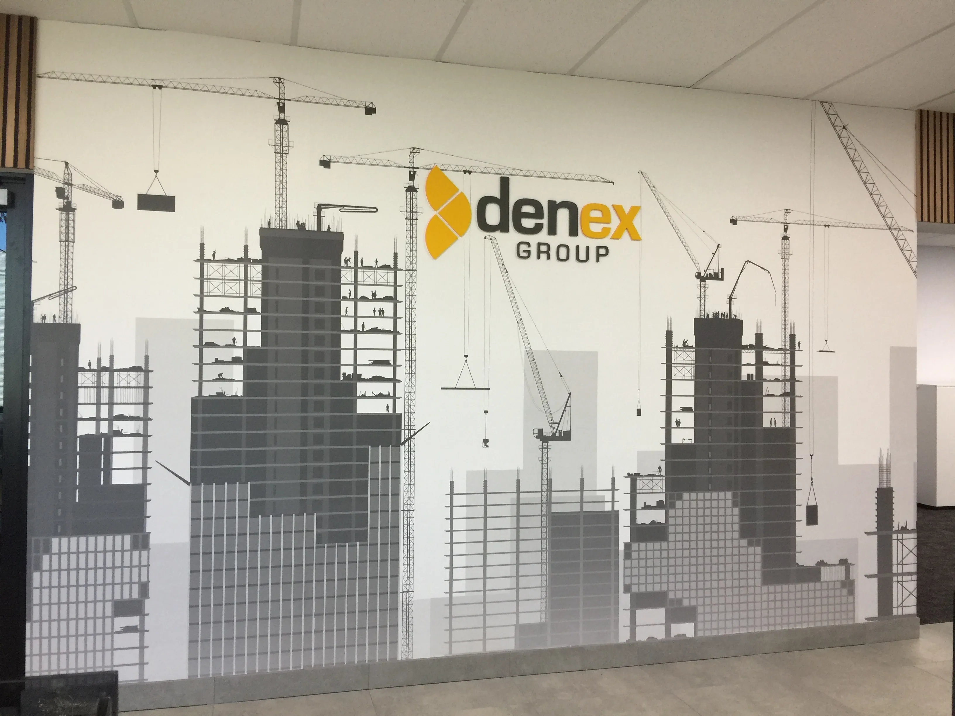 Custom wallpaper with technical illustration and addditional perspex logo lettering for NSW building company