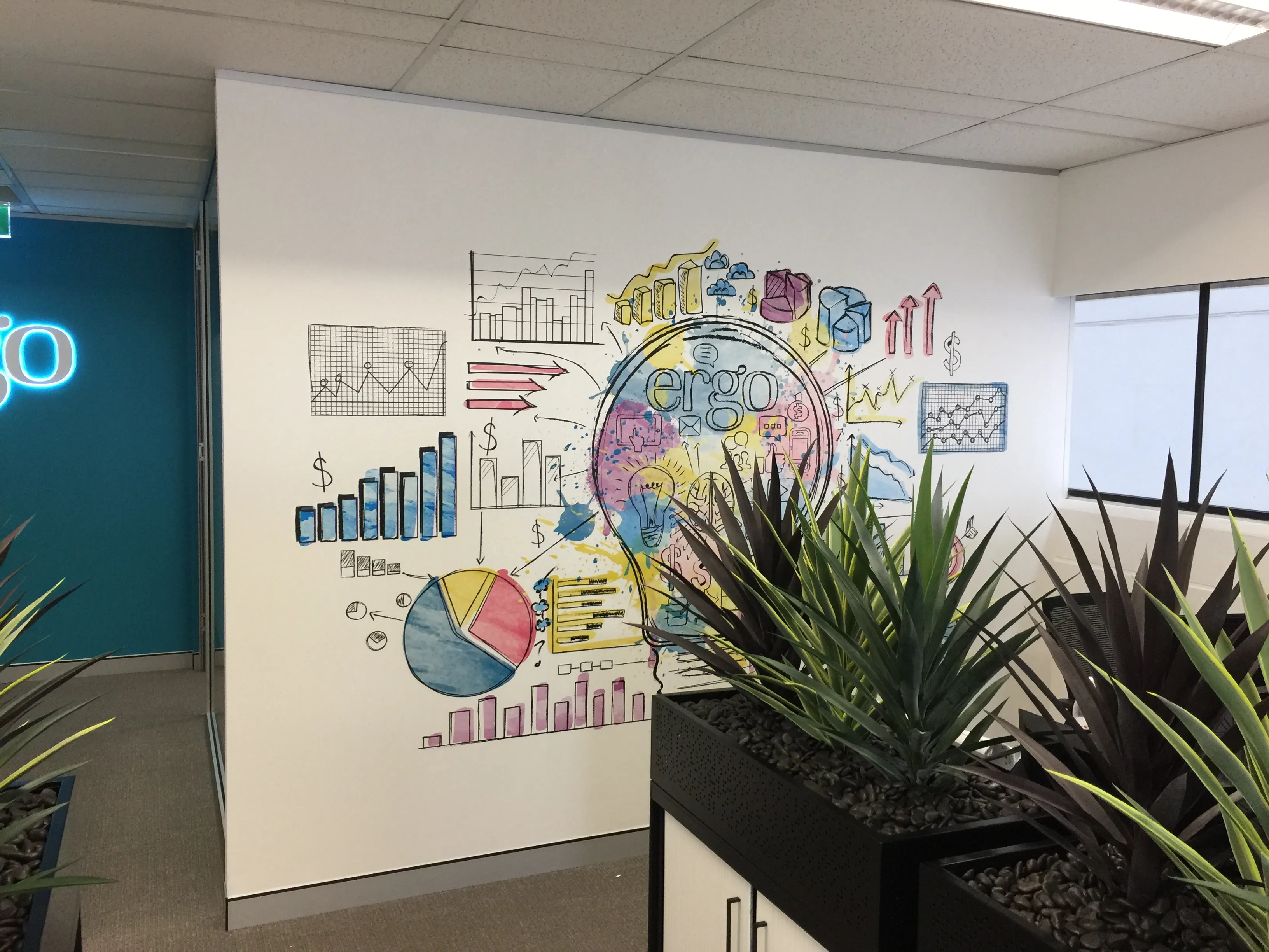 Custom wallpaper mural in advertising office with company branded illustration