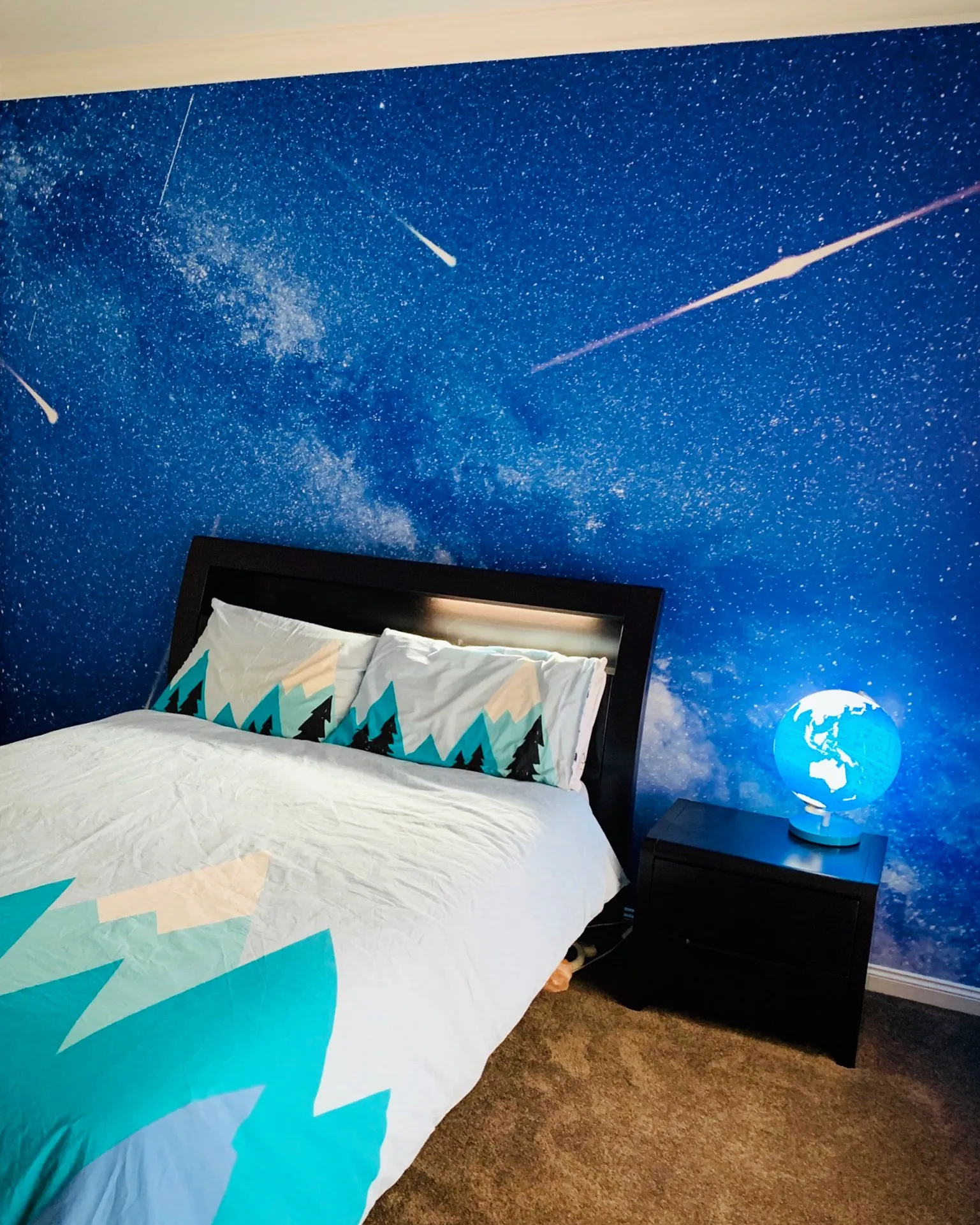 Bedroom with custom printed night sky wallpaper mural