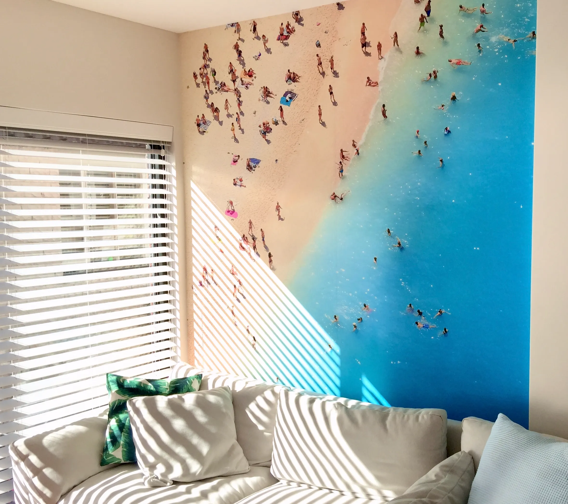 Aerial beach view on custom printed wallpaper in living room