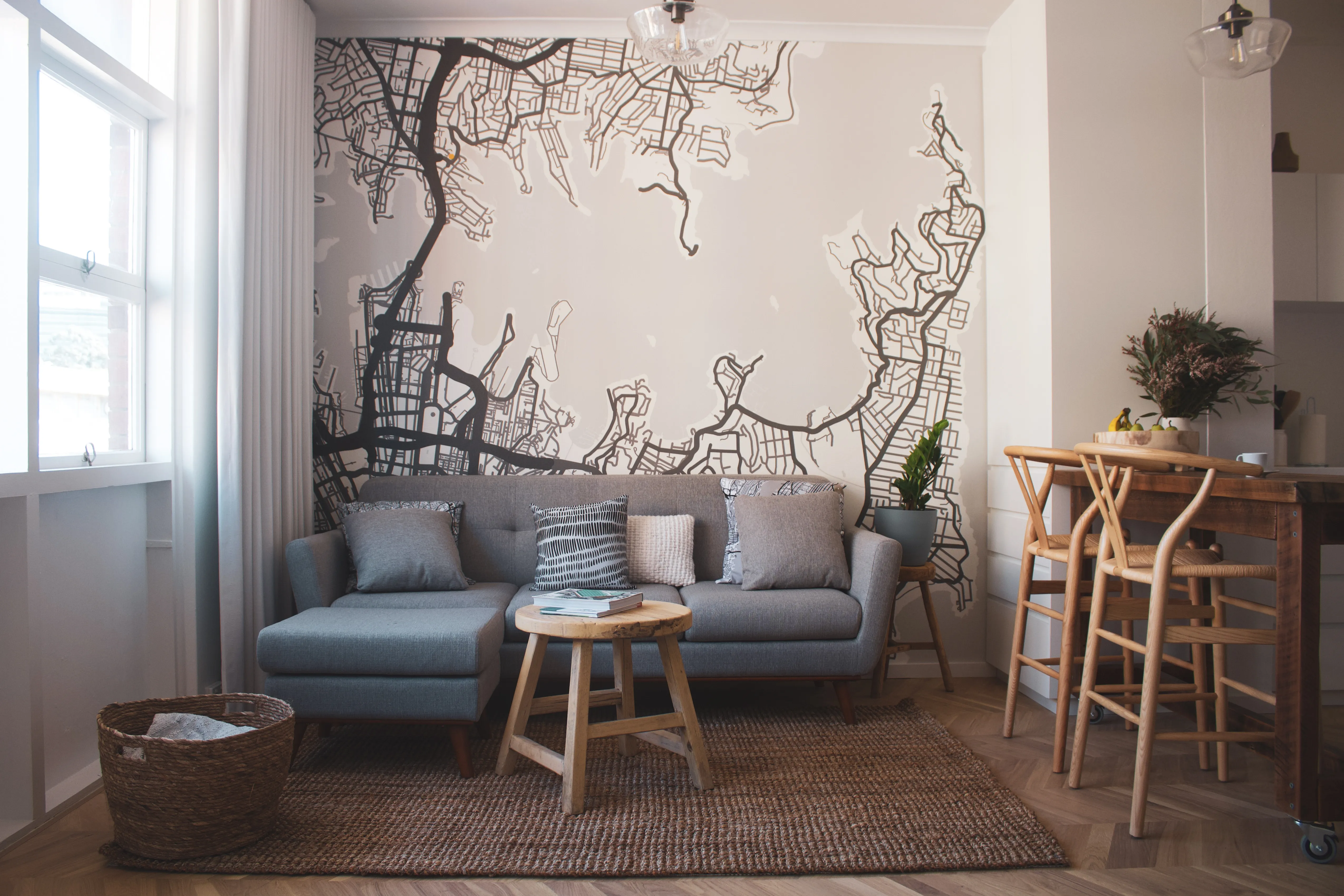 Custom printed wallpaper mural with stylized map of Sydney in living room