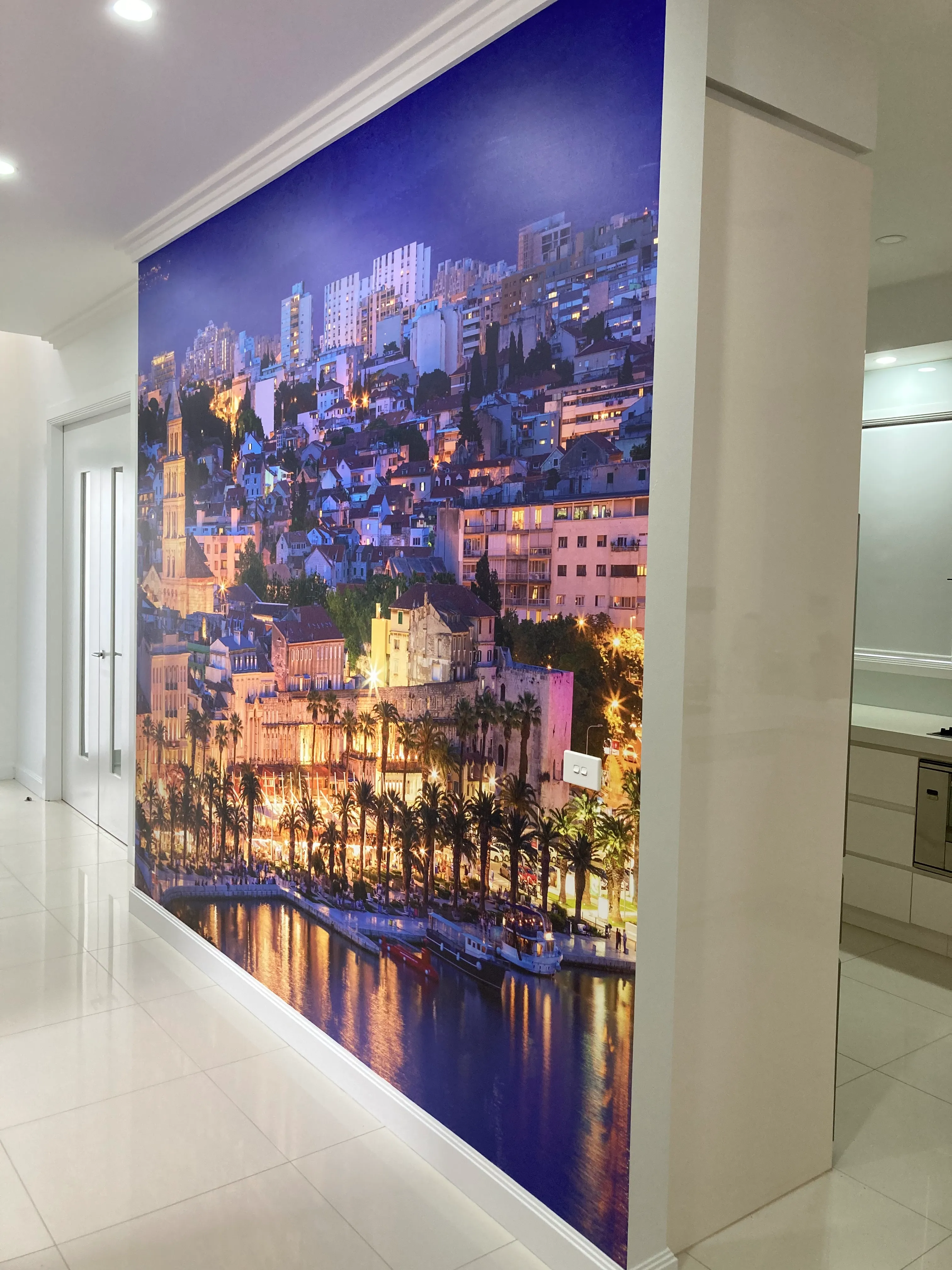 Night photo of Dubrovnic on custom wallpaper for living room