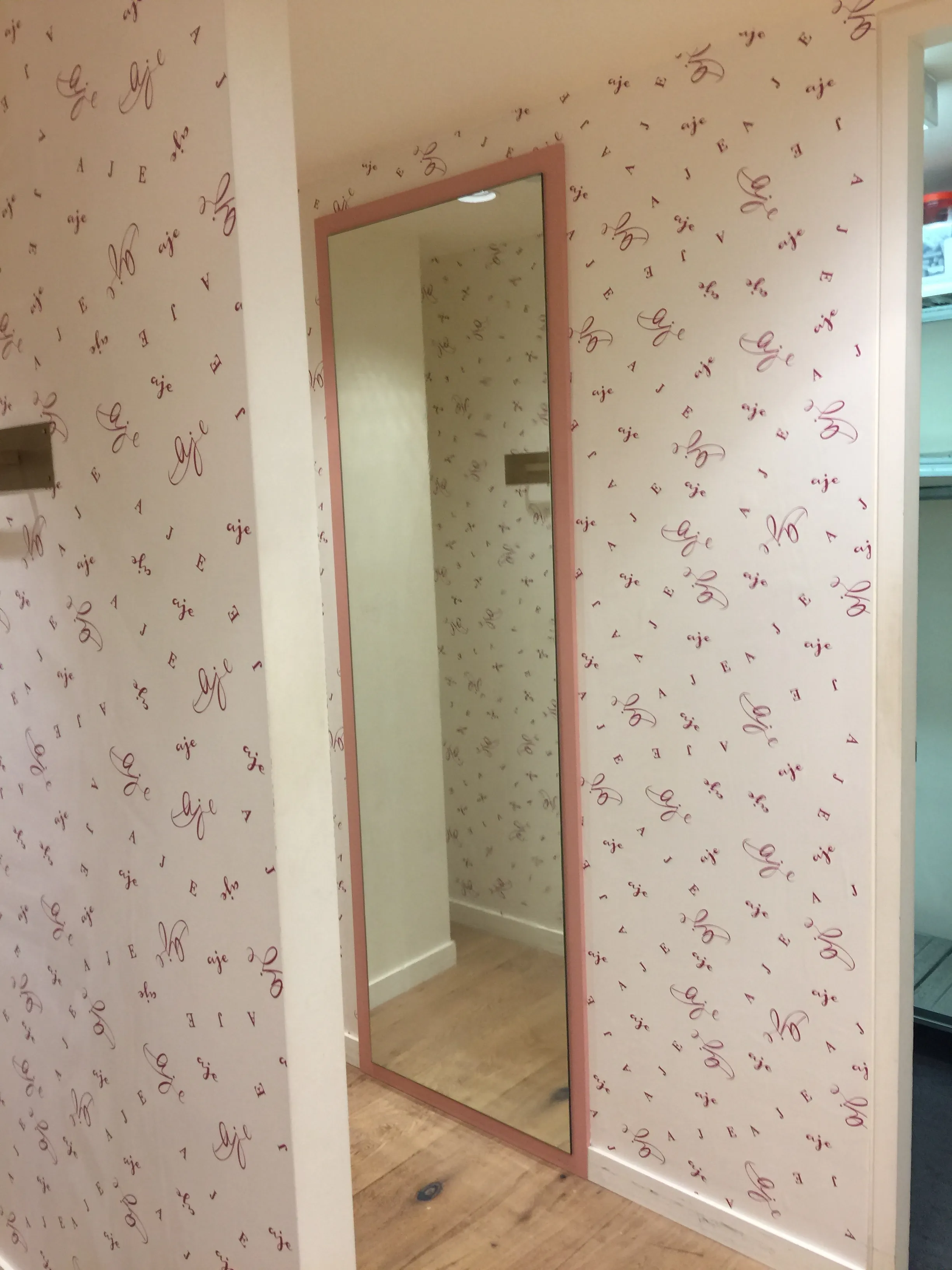 Branded wallpaper for pop-up fashion shop