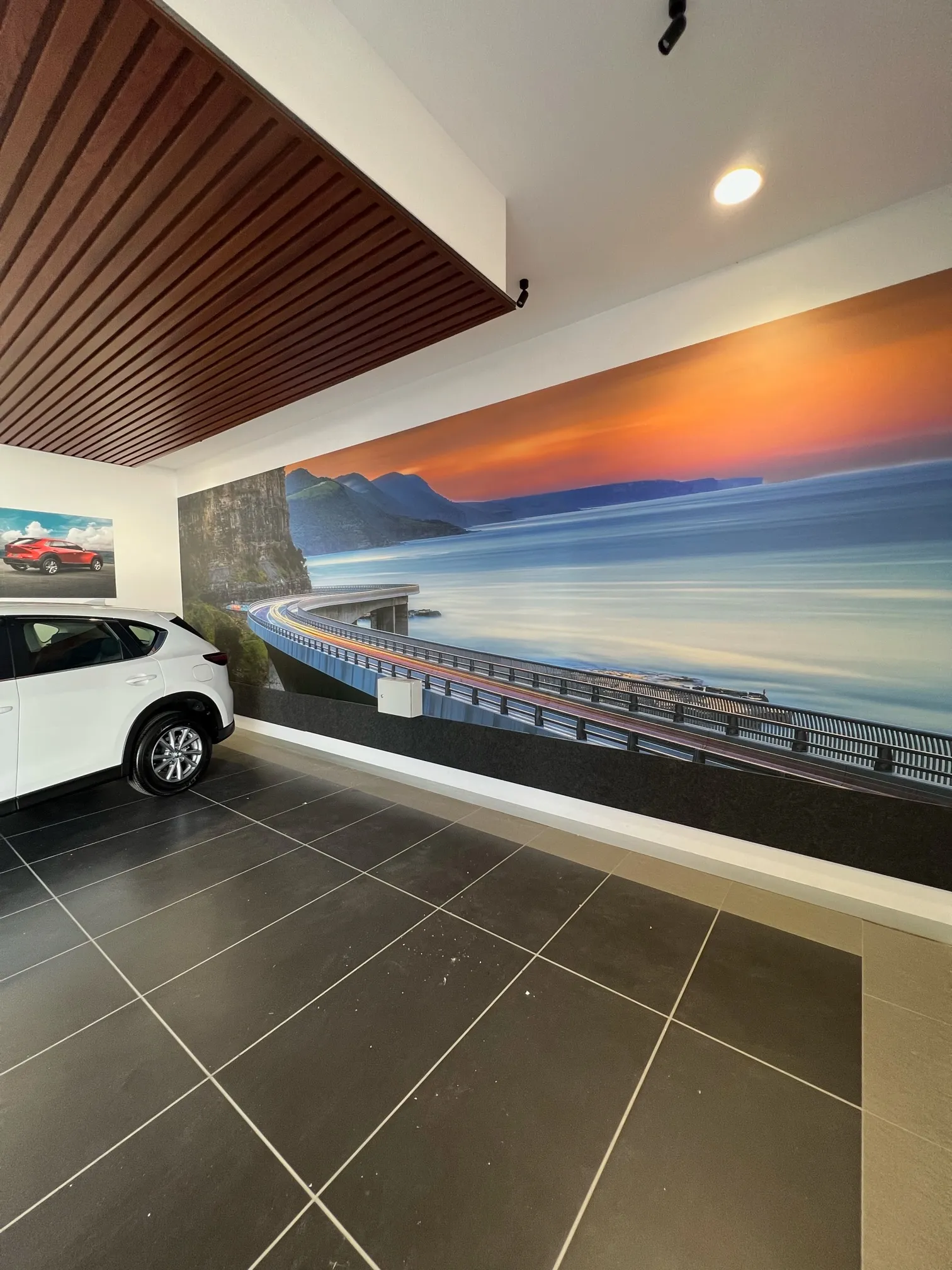 Large panoramic wallpaper mural in car dealer exhibition area