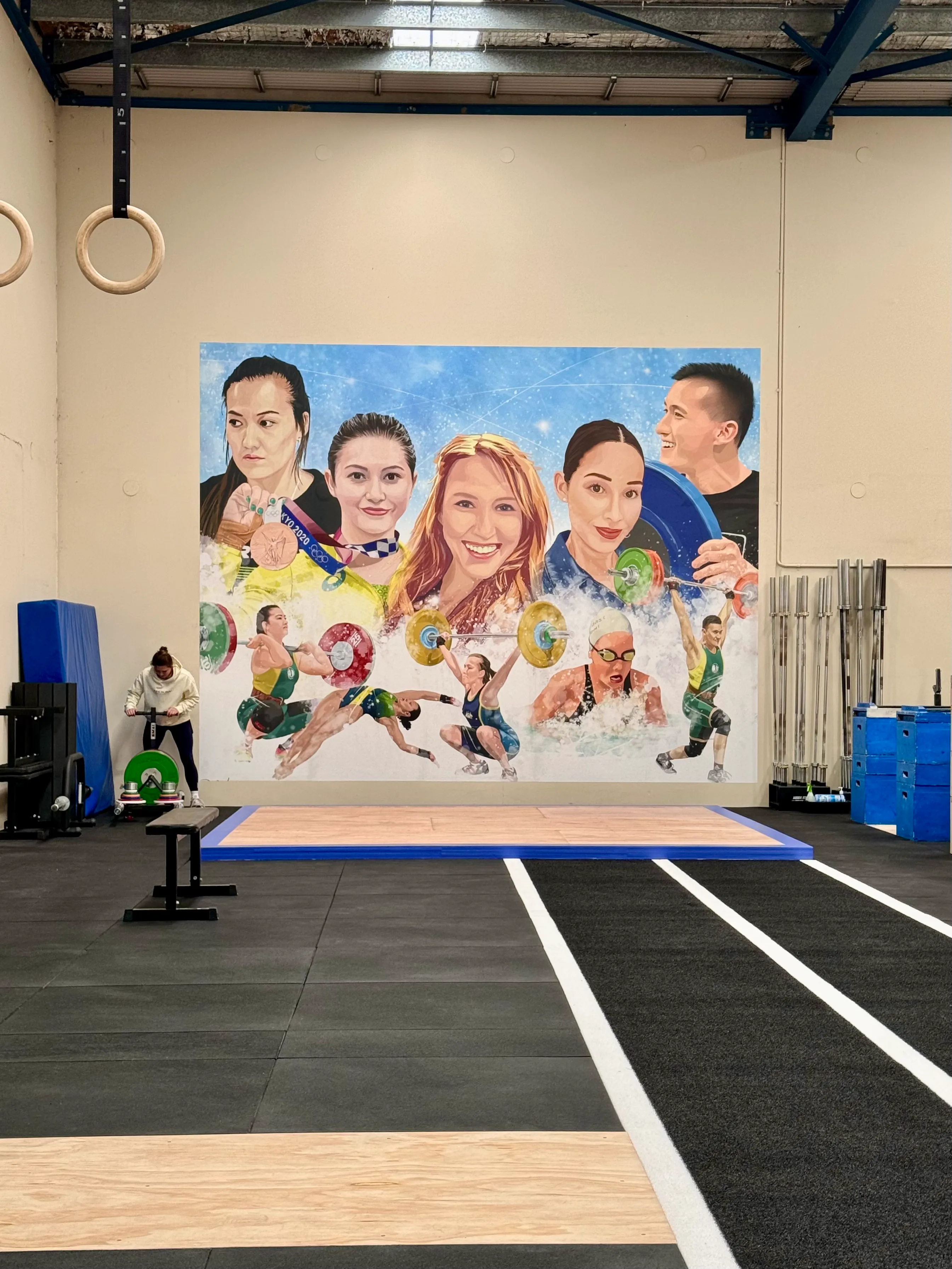 Sports illustration on custom printed wallpaper in weighlifting gym