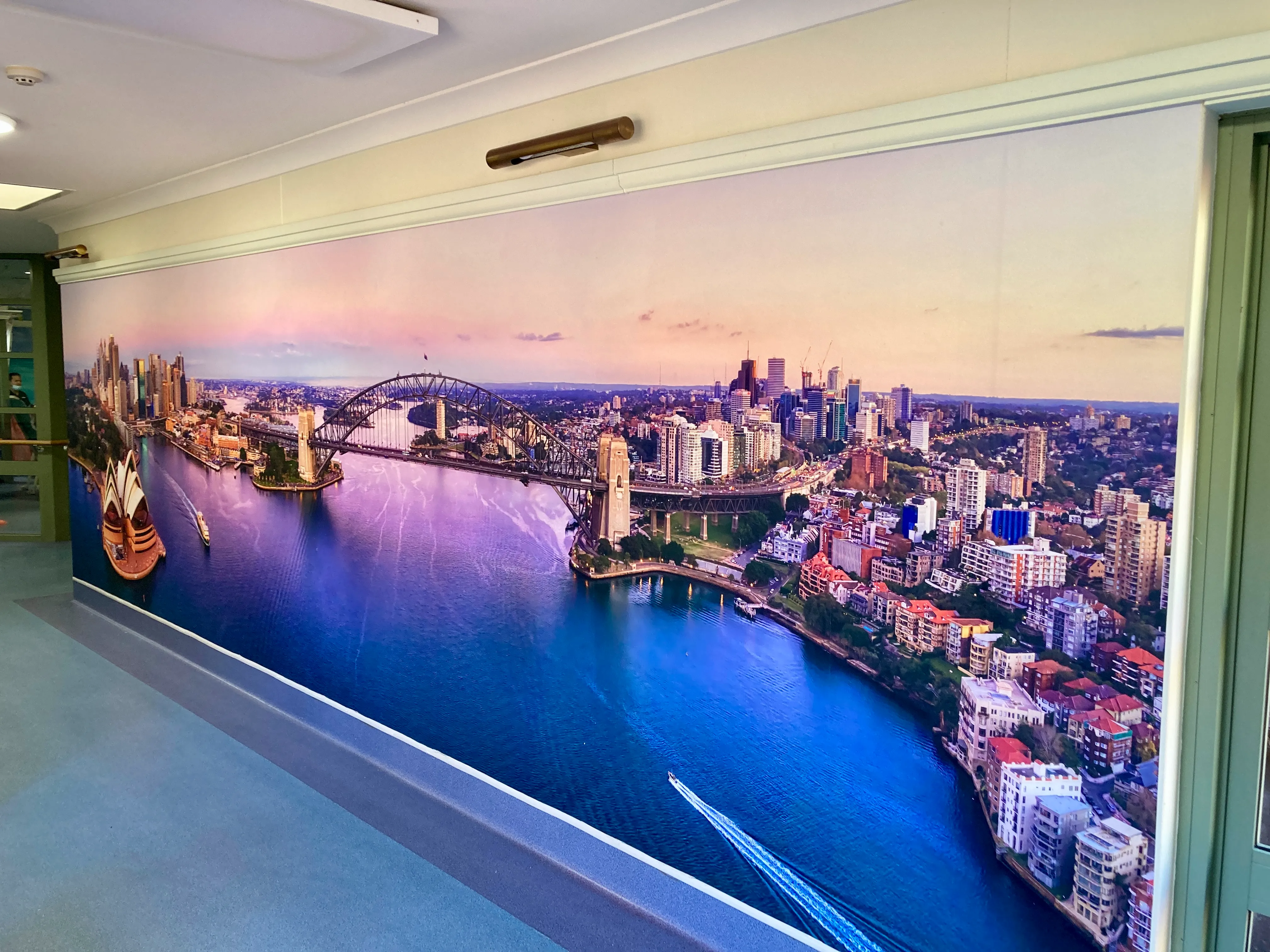 Sydney at sunset wallpaper mural in the corridor of a Uniting Aged Care fac