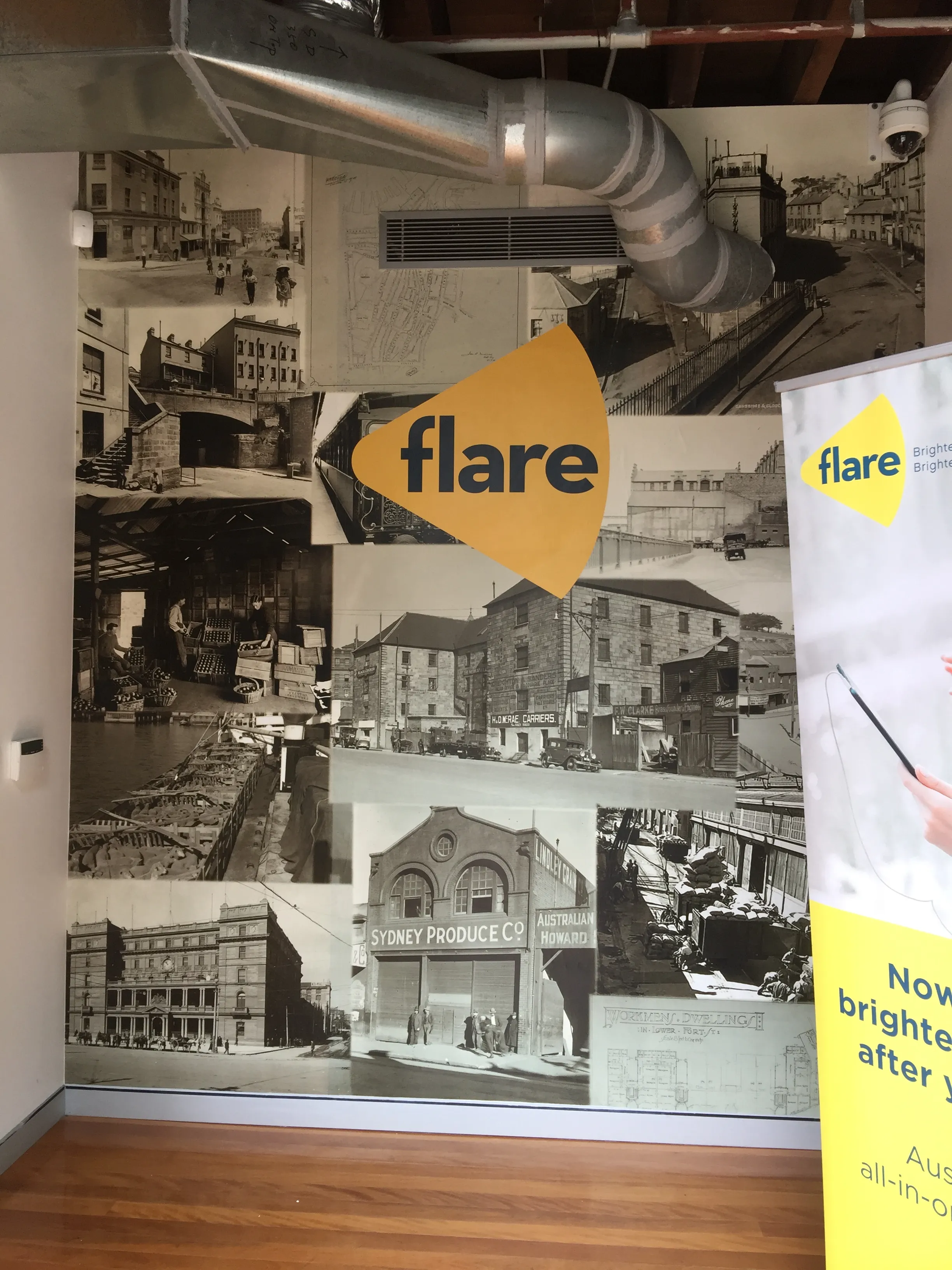 Collage with vintage photos of Sydney on custom printed wallpaper for start-up company