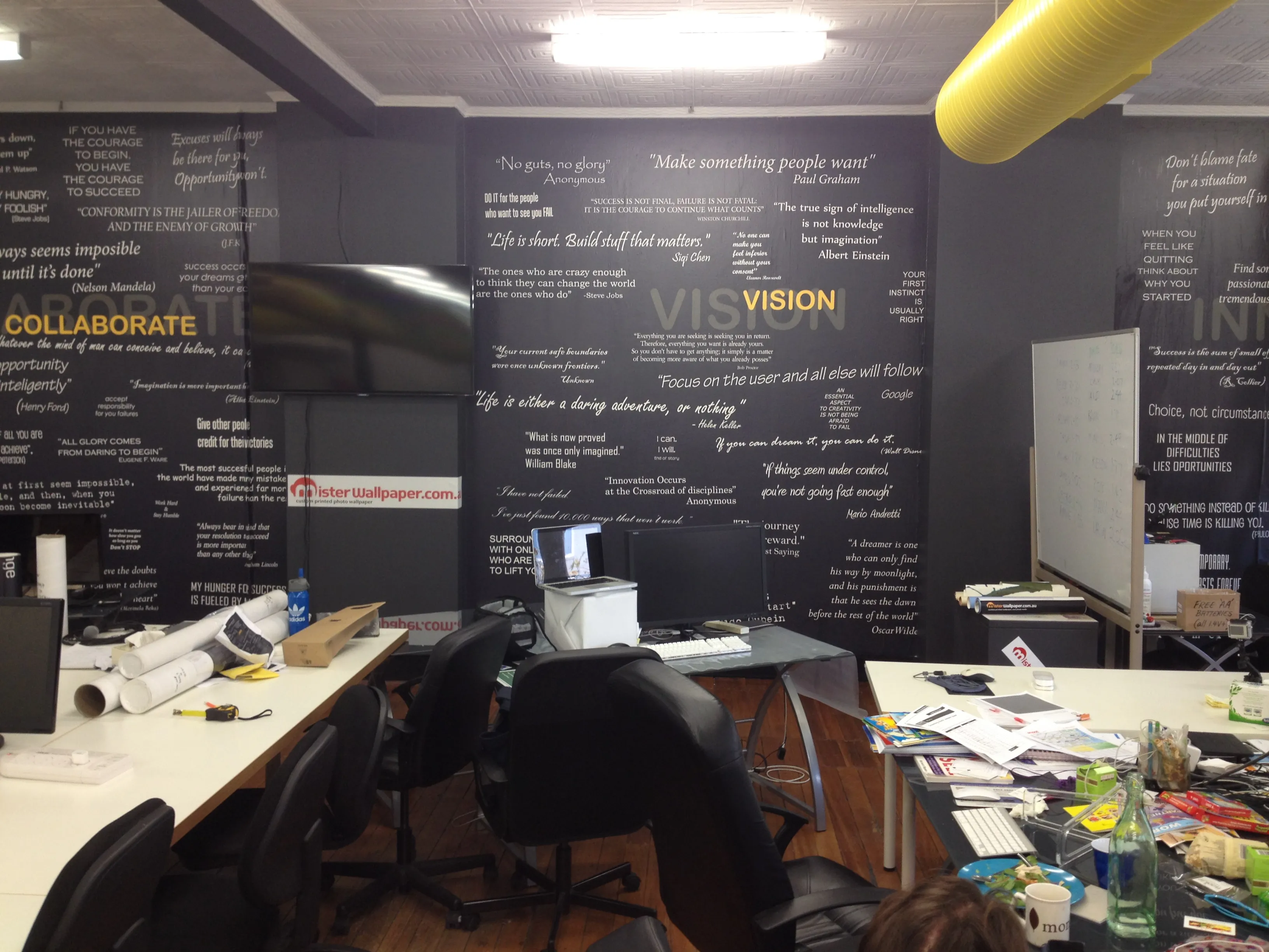 Custom printed wallpaper with motivation citations for Sydney's start-up space Fishburners